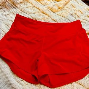 Lululemon Coral color size 8 tall shorts.  EUC